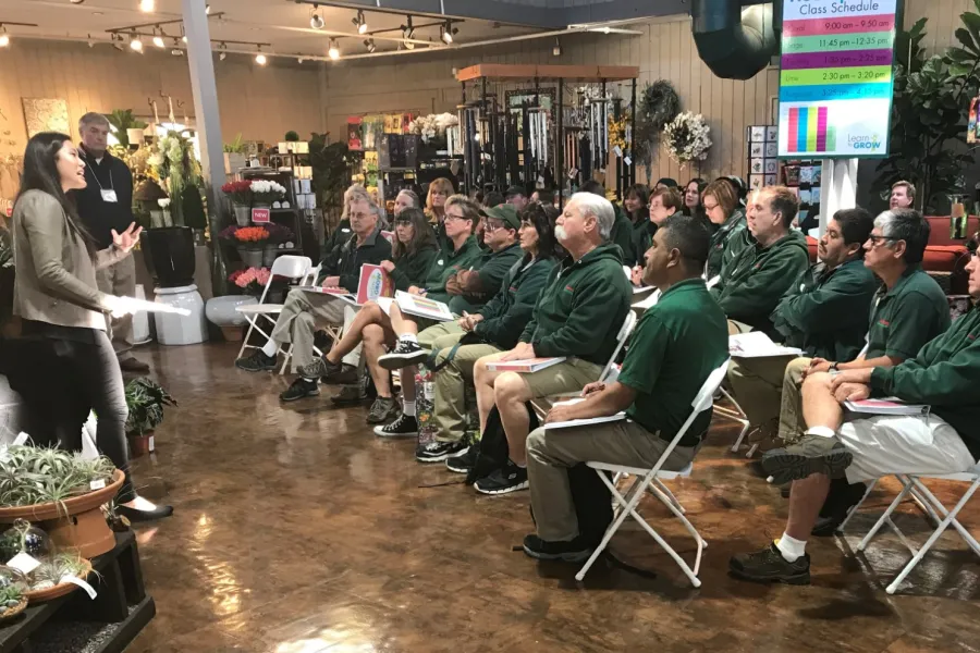 a group of people sitting in chairs