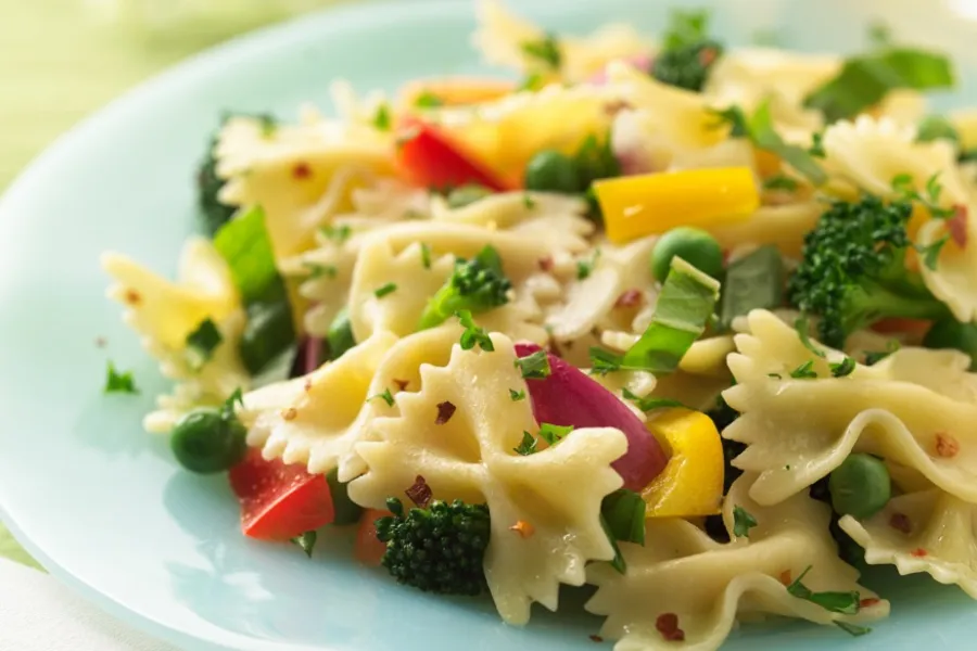 pasta primavera with garden veggies and fresh herbs