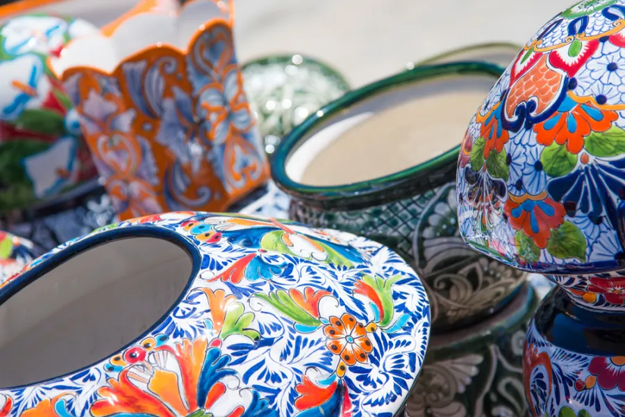a vase filled with flowers sitting on a table